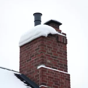 Czy ocieplać komin nad dachem